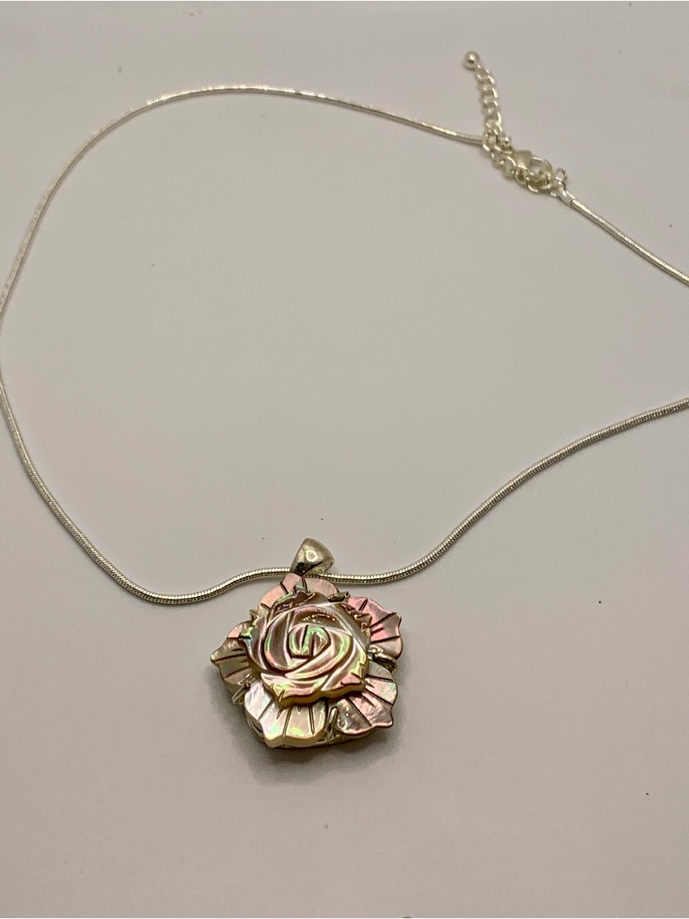 Mother of Pearl Craved Rose Pendant on Silver Tone Chain